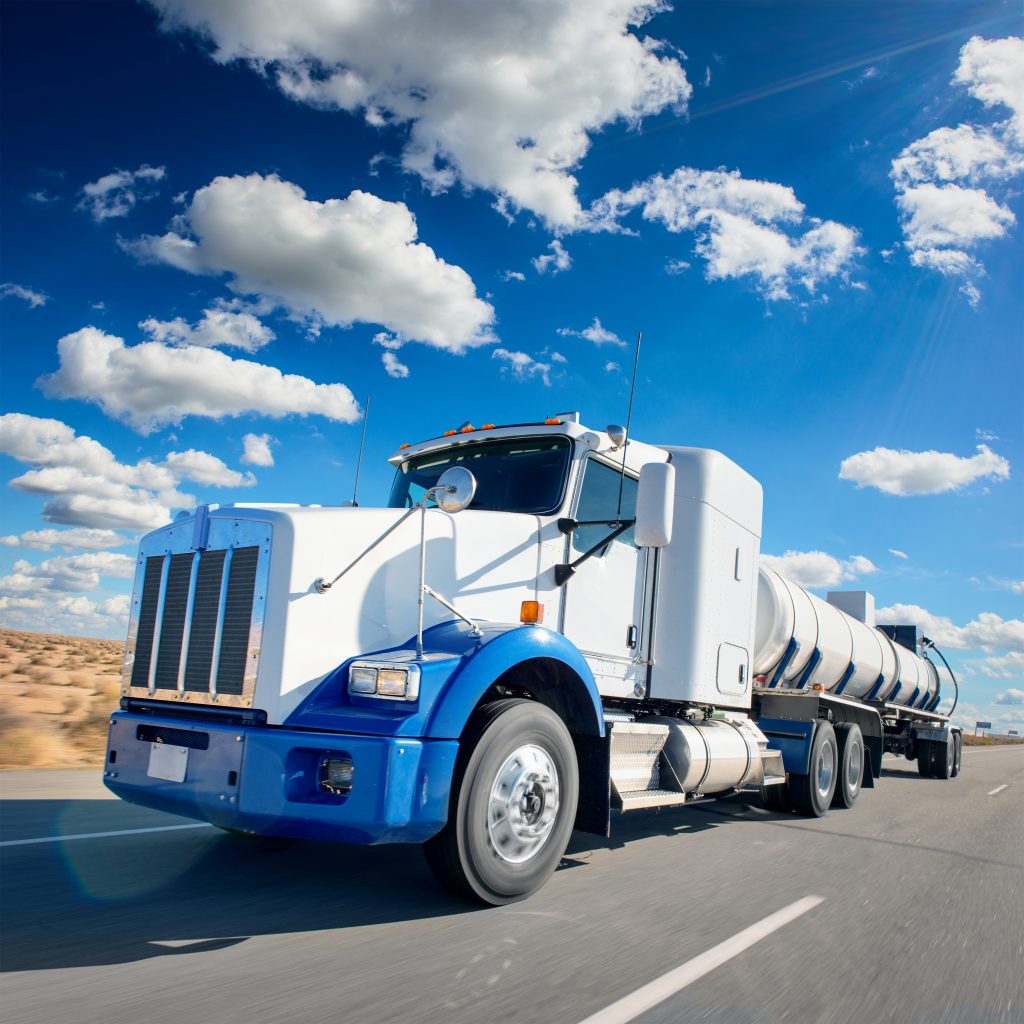 Truck and highway at day transportation background